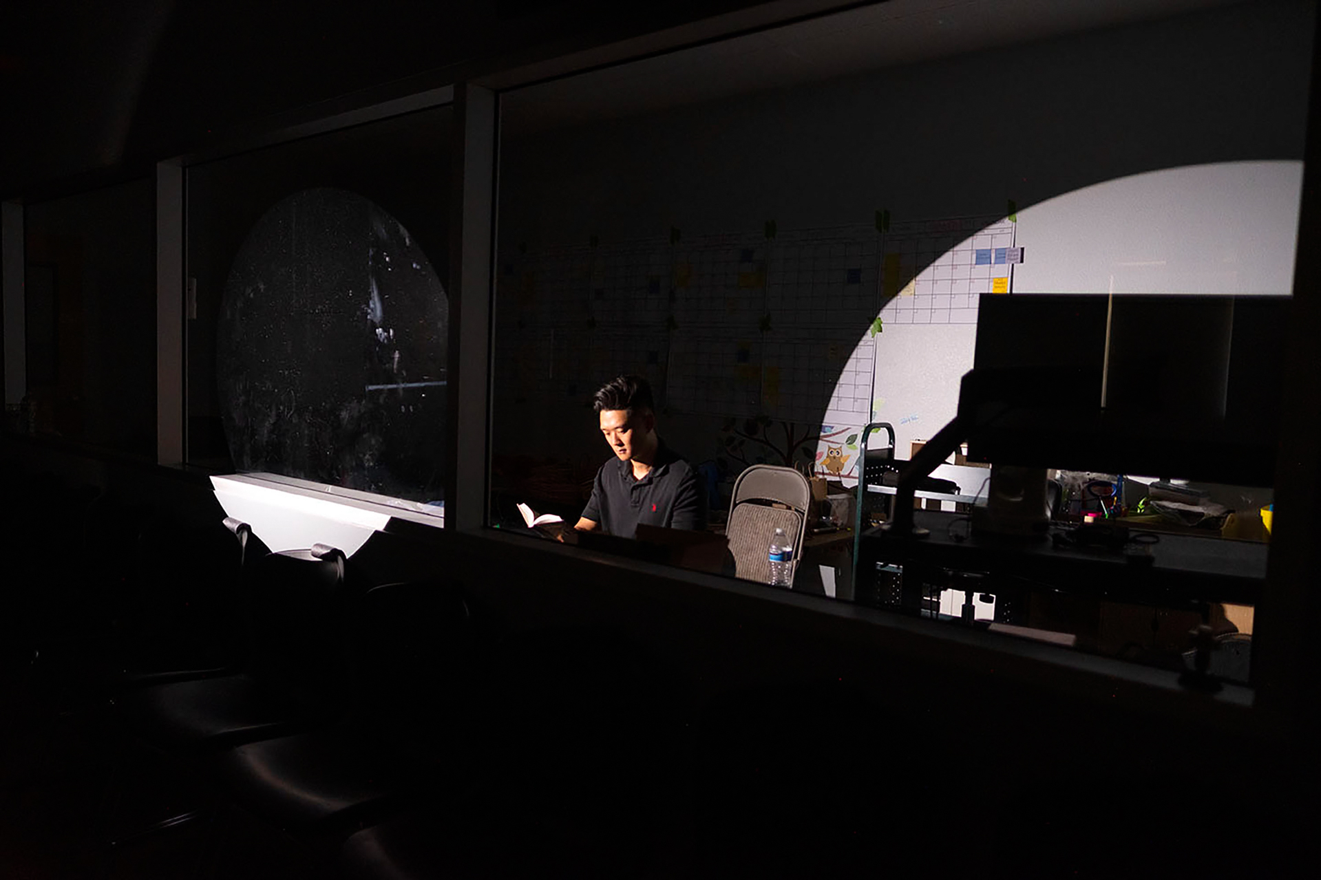 A man sitting and reading